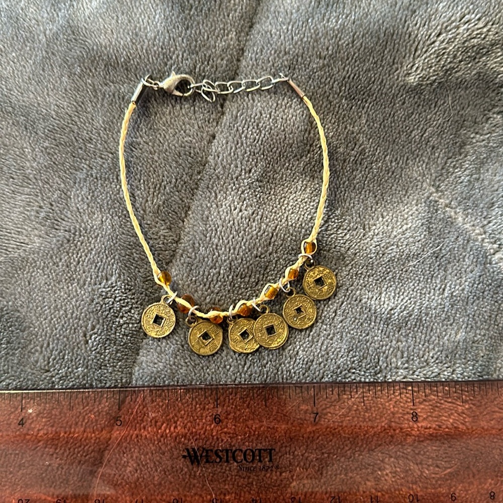 Charm Bracelet with Foreign Coins